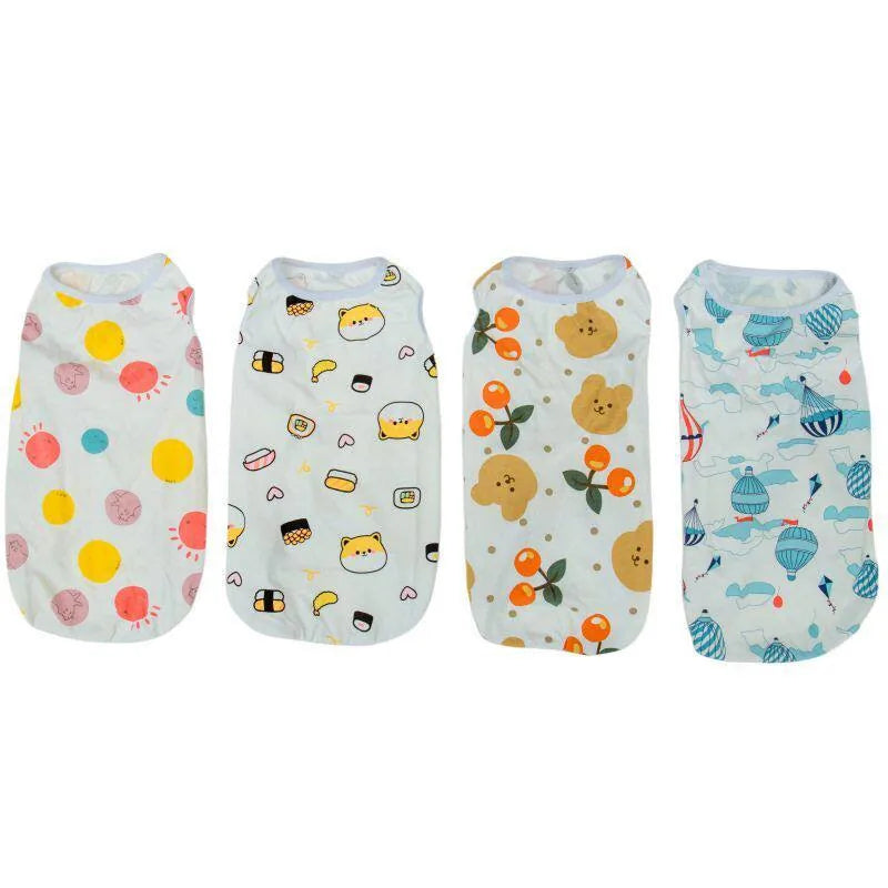 Four printed dog vest designs laid flat